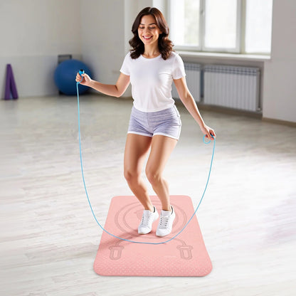 Corde a sauter sur tapis gym rose